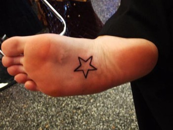 Tatuaje de Estrella en la planta del pie