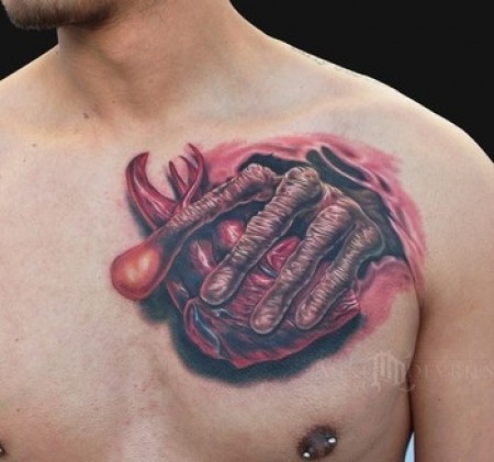 Tatto on Tatuaje De La Mano De Te Sacando El Coraz N Del Cuerpo