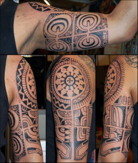 Tatuaje maorí rodeando el brazo