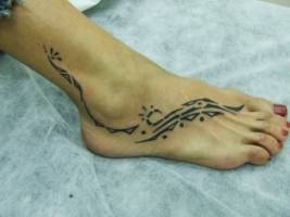 Tatuaje para mujeres en el pie