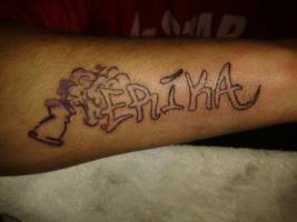 Tatuaje del nombre erika en el antebrazo