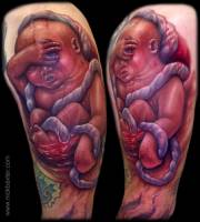 Tatuaje de un bebe por nacer