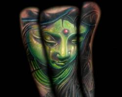 Tatuaje de una cara de Buddha
