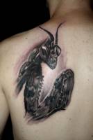 Tatuaje de una mantis religiosa