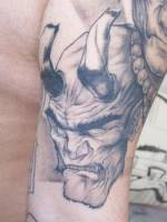Tatuaje de un demonio  con cuernos