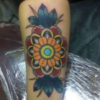 Tattoo de una flor old school en color